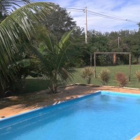 VISTA DA PISCINA PARA O CAMPO DE FUTEBOL