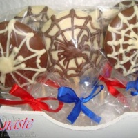 Pirulito com teia e aranha