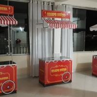 Carrinho de lanches. Pipoca, algodão doce, batata frita, churros, crepe suíço, hambúrguer, picolés