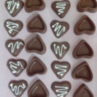 porta-jóia de chocolate, com recheio de doce de leite, chocolate, ou côco (vai na forminha)- R$ 1,50