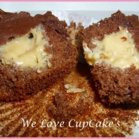 Massa de Chocolate com recheio de Doce de Leite com Coco e cobertura de Ganache de Choc ao Leite